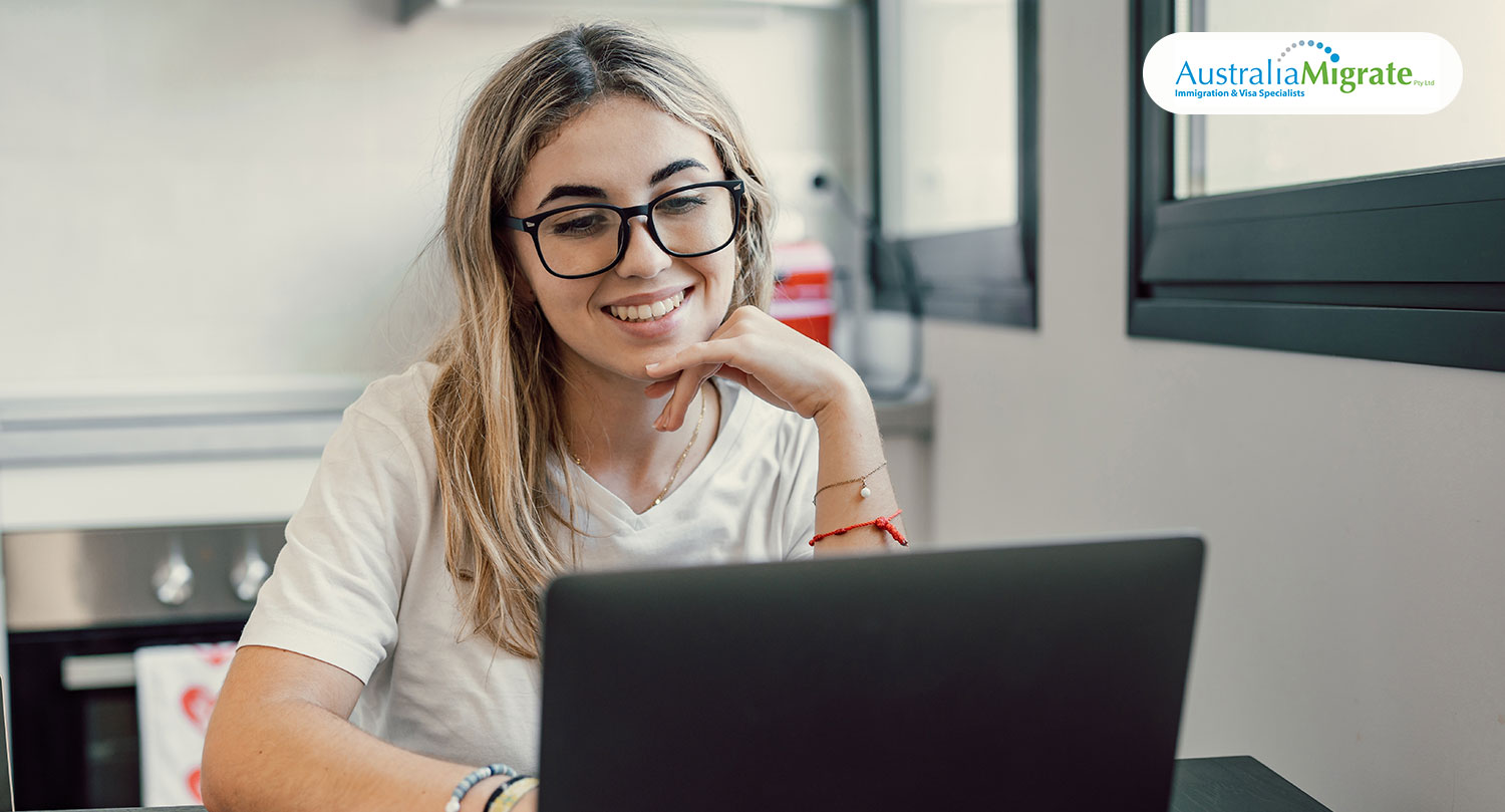 Registered migration agent reviewing Subclass 482 Skills in Demand sponsorship visa requirements with an Australian employer in a Sydney office