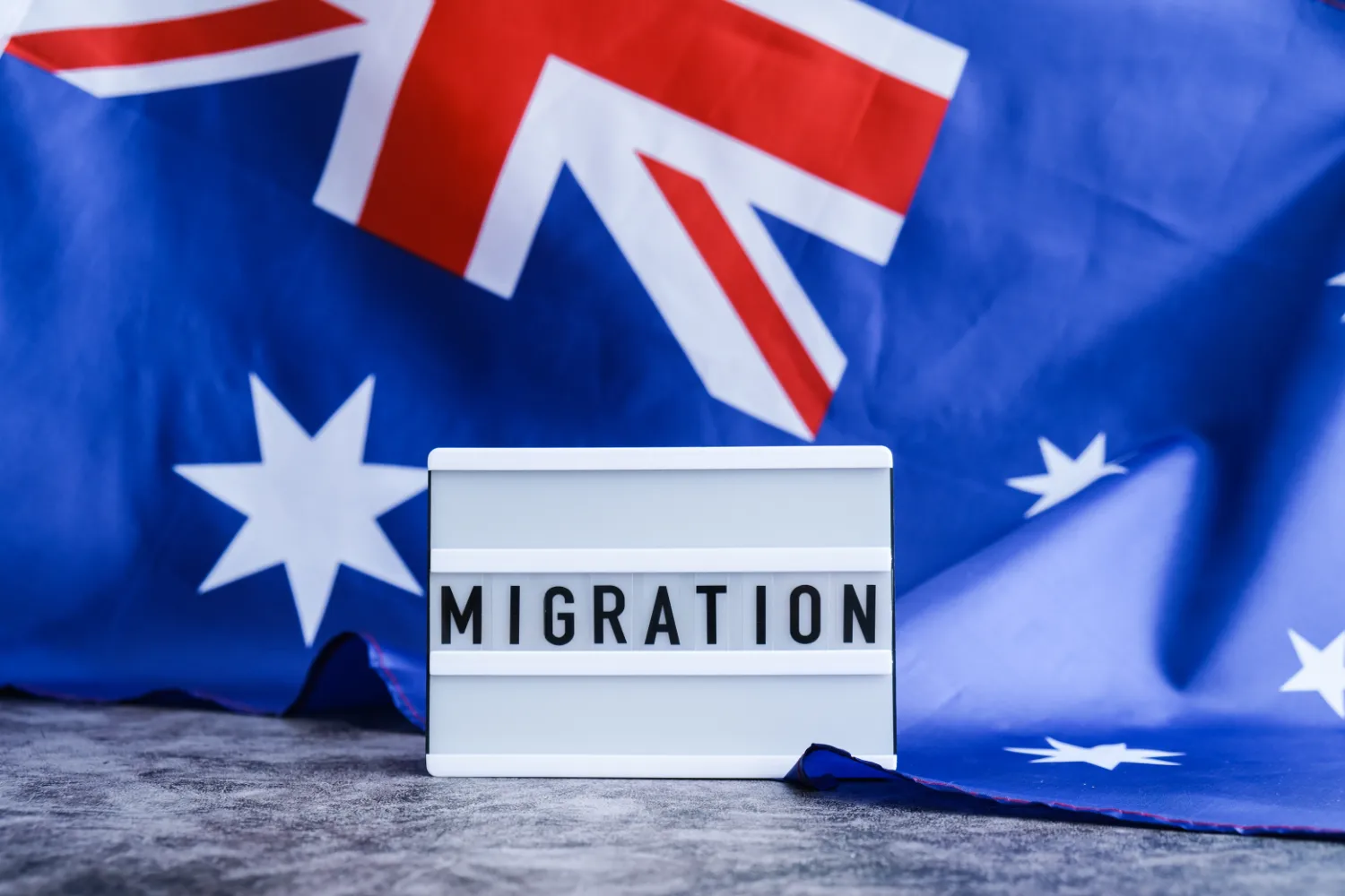 Registered migration agent in Australia reviewing a client's visa application documents