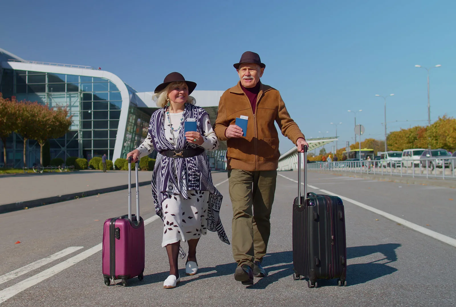 Older parents arriving at an Australian airport to reunite with adult children on a parent visa